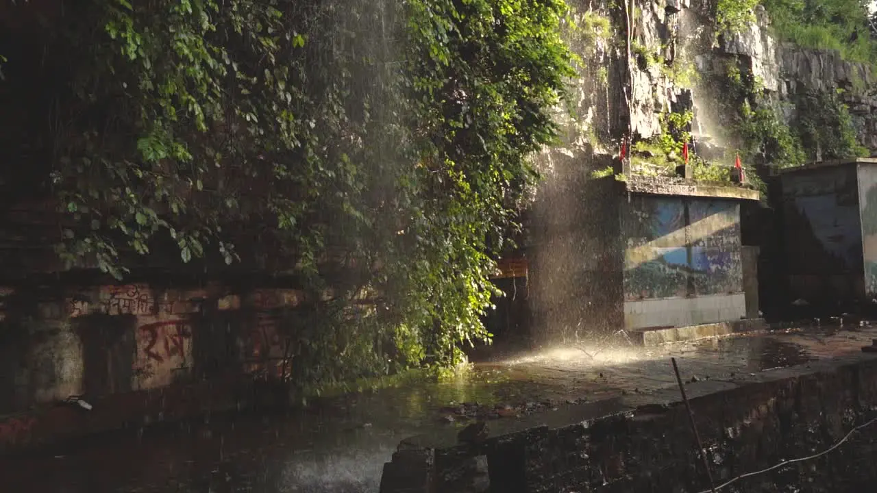 Slowmotion shot of a Waterfall flowing at a temple of Shivpuri Madhya Pradesh  India