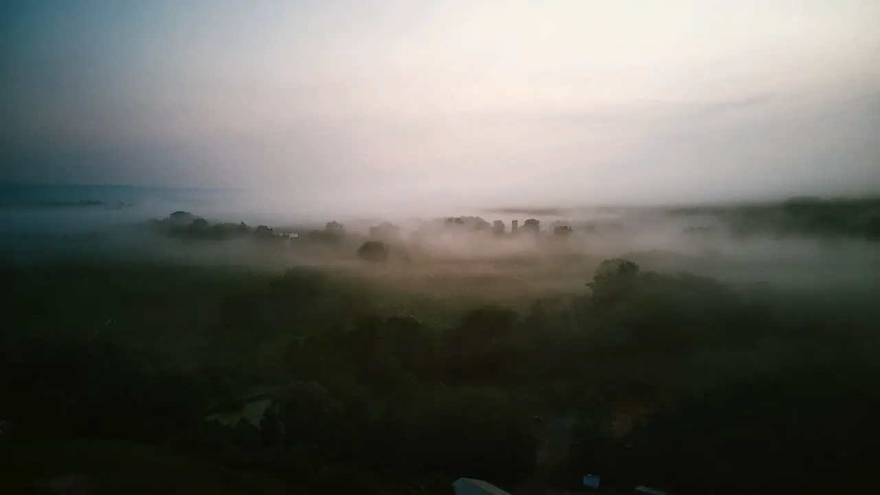 Drone Shot on Farm in the morning with low clouds