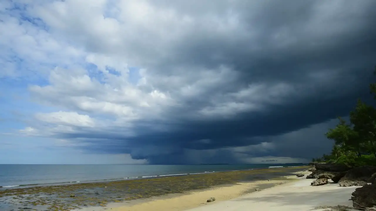 Dramatic Seascape Timelapse of Monsoon clouds and rains over the sea in Tanzania's Dar Es Sallam beach