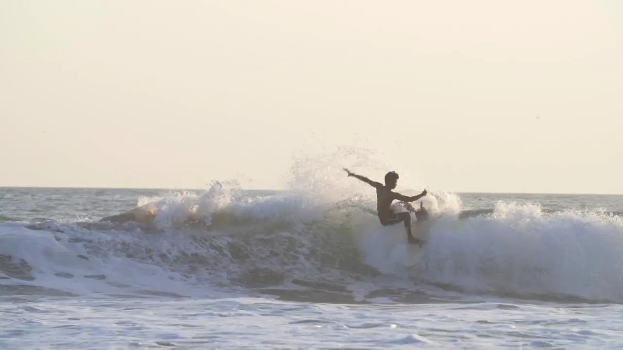 Man Surfing in Slow Motion