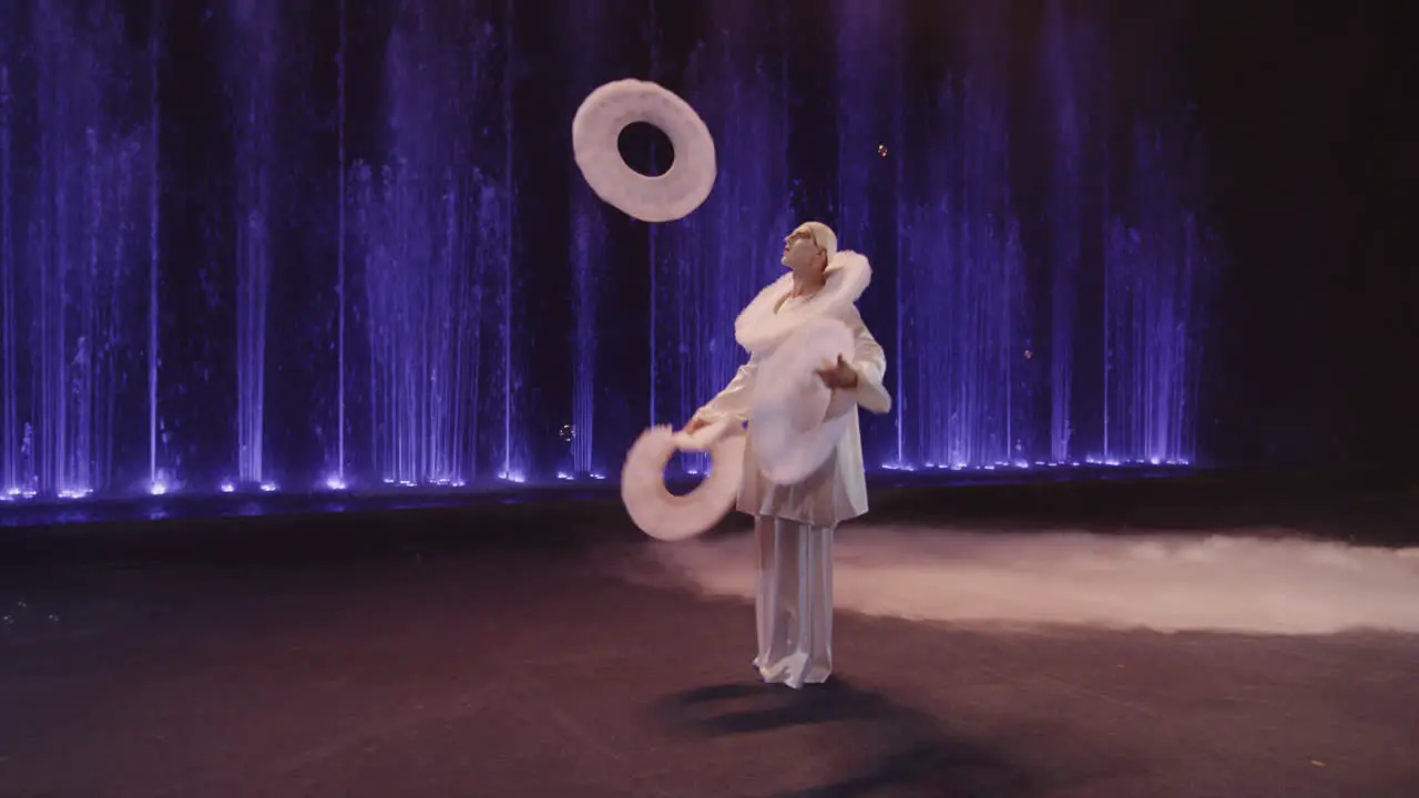 Circus performer juggling rings