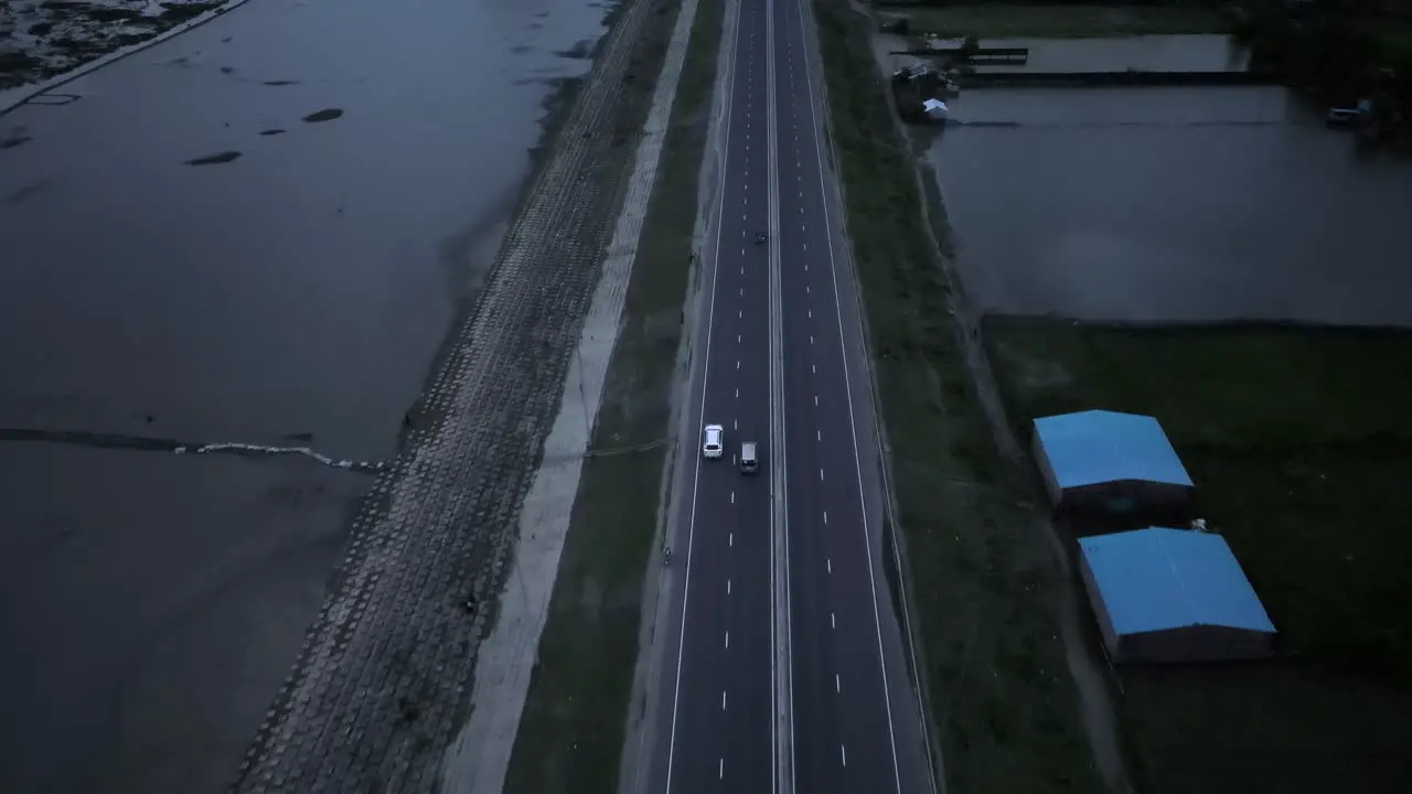 4k Drone shot of car moving on a road