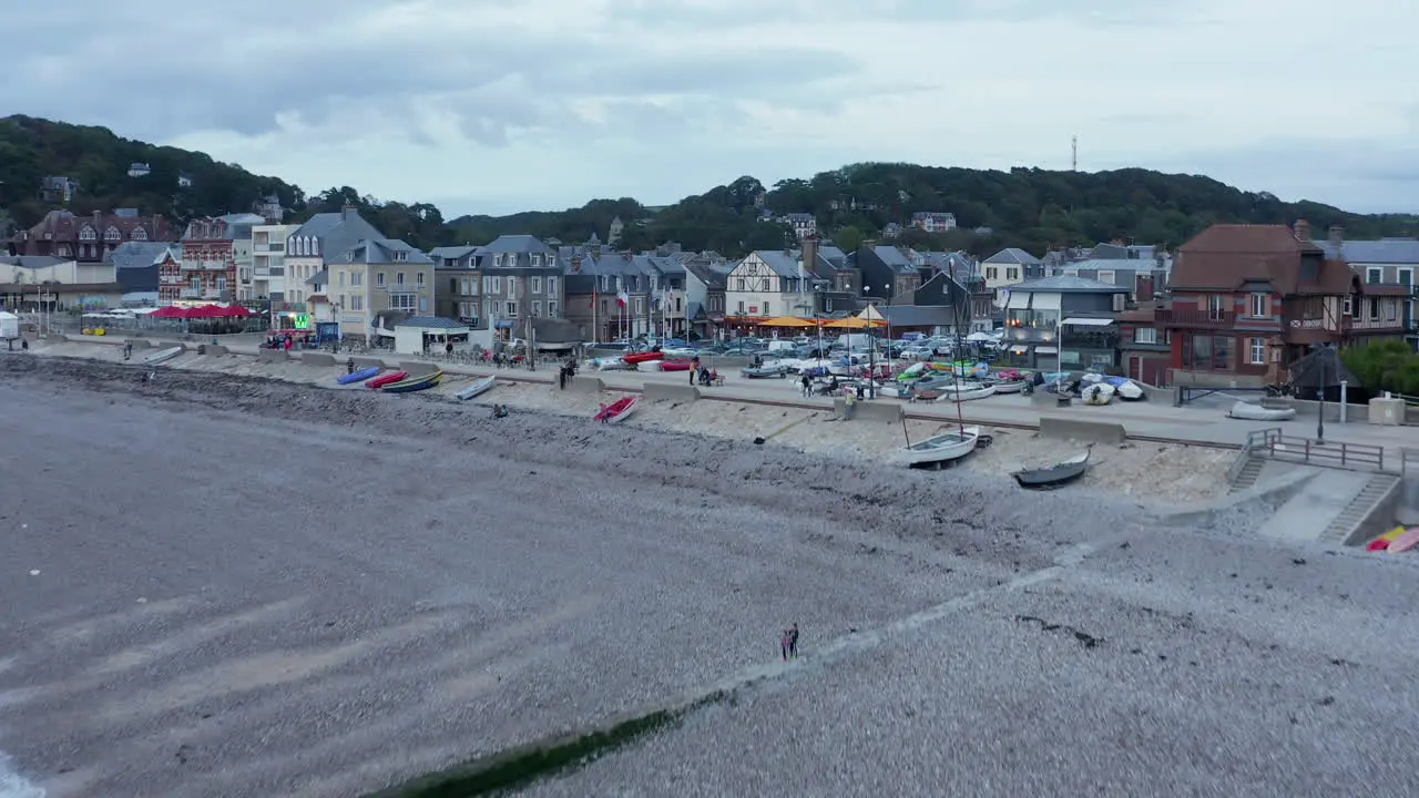 Small Beach Town in France close by Etretat Cliff Aerial Forward revealing City