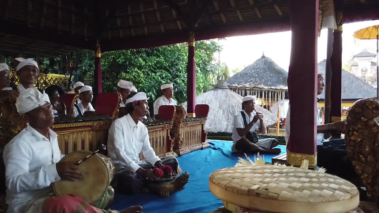 Gamelan Orchestra Plays Music in Bali Hindu Temple Ceremony Cultural Artists represent Indonesian Culture