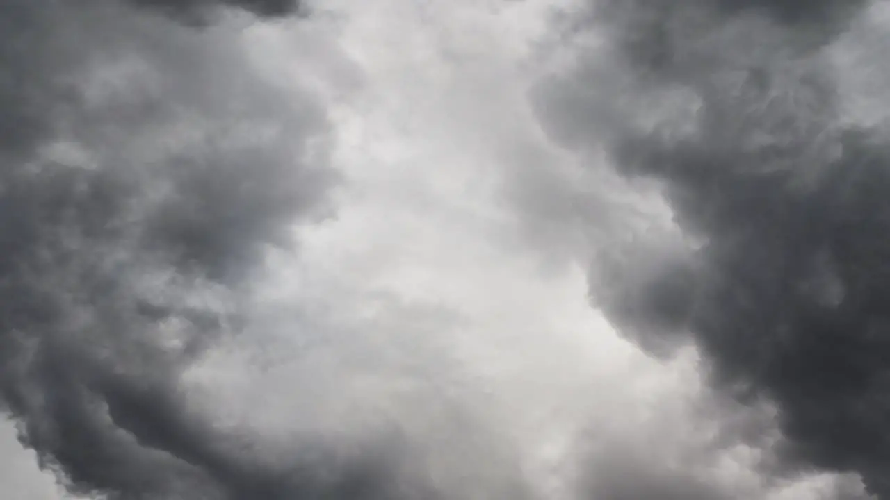 A dark cumulonimbus cloud and a thunderstorm