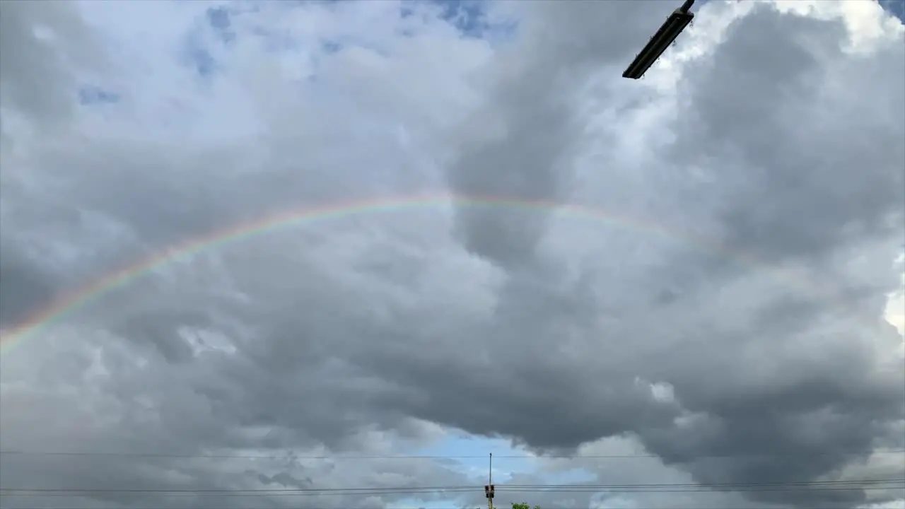 Rainbow over cloudy sky in Thailand