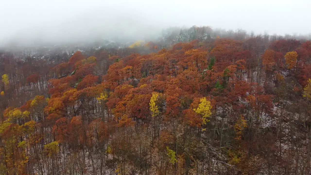 Foggy and misty mountainside of the snowy Mount Washington located in New Hampshire in United States of America