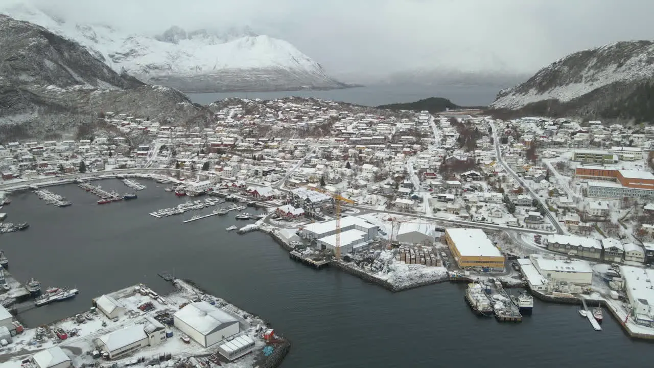 Freezing winter weather with snow over Skjervoy village in Northern Norway aerial