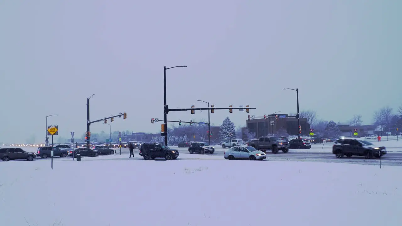 Cars driving on snow covered highway