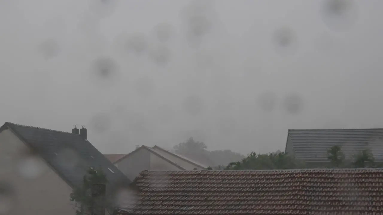 Heavy rains pour as water droplets start falling on window glass in France