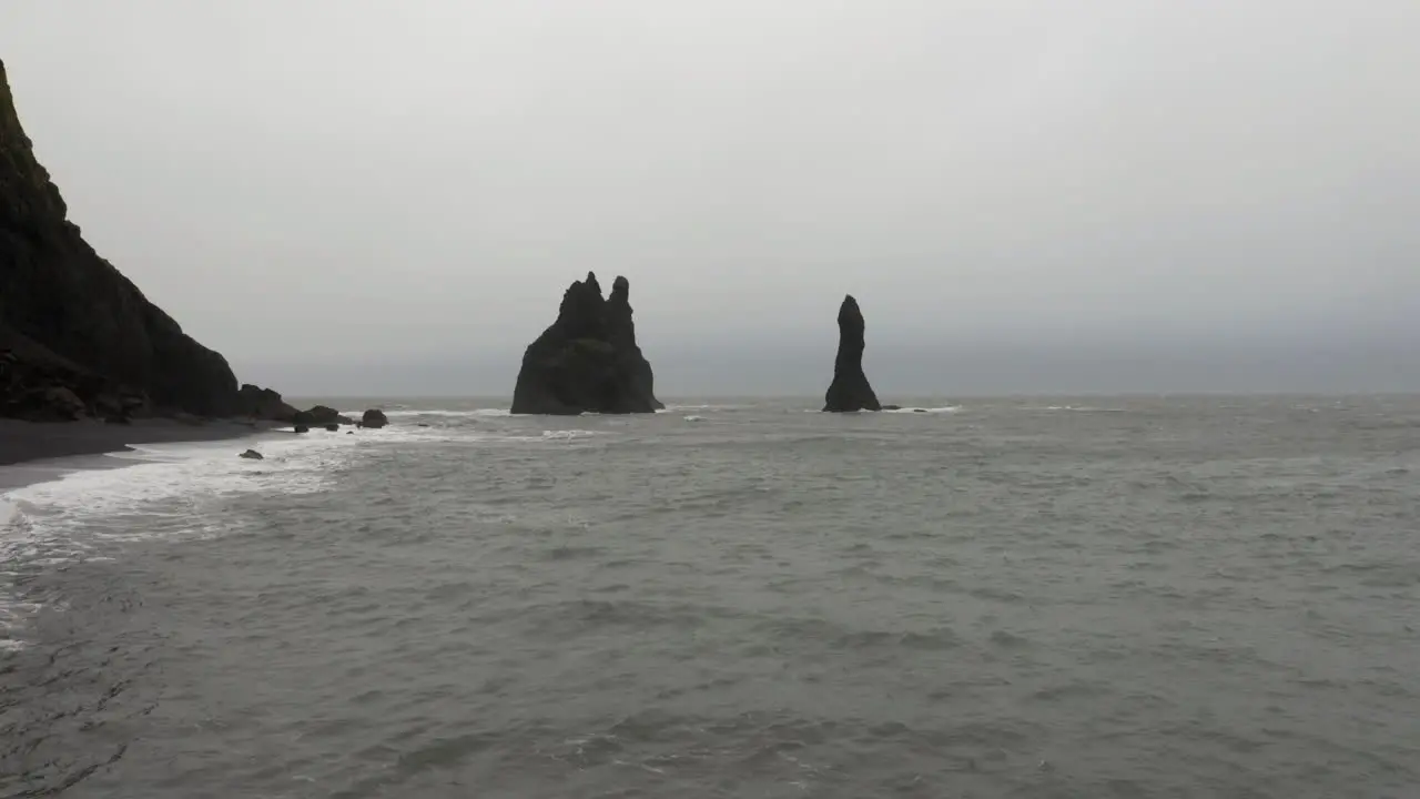 Drone shot of Reynisdrangar Rocks in a stormy sea