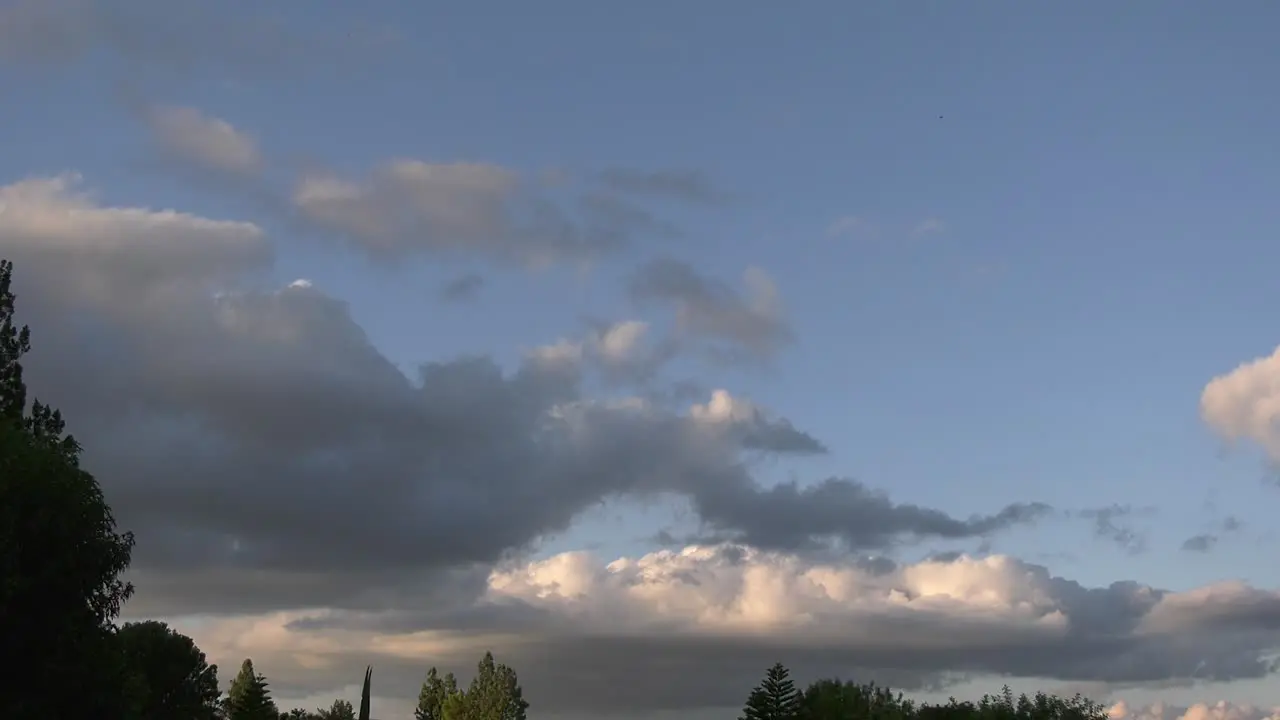 Clouds form during orange sunset