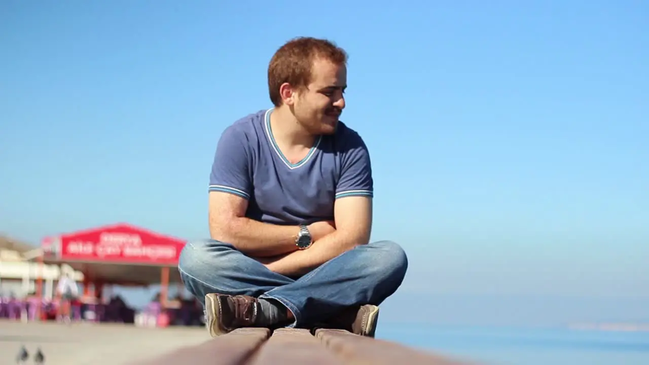 Lonely Romantic Man Looks At Ocean