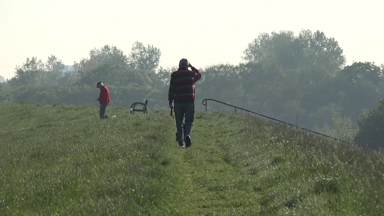 Germany man and dog on dike