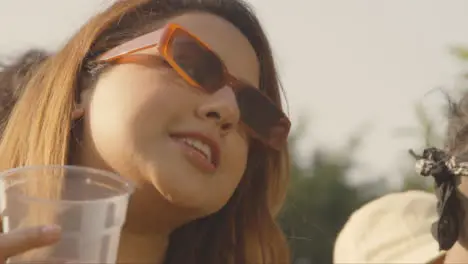 Close Up Shot of Young Festival Goer Enjoying Music at a Stage Barrier