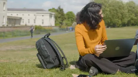 Handheld Shot of Student Working In a Park