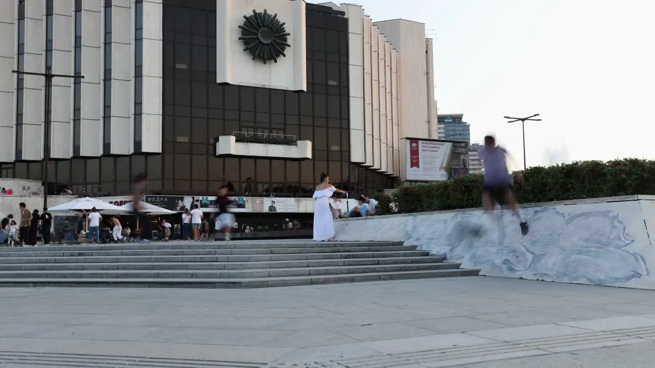 Tourists walking by the entrance to National Palace of Culture Bulgaria Congress Centre Sofia NDK