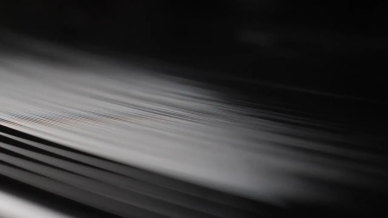 Close up macro shot of old vinyl disc spinning on a record player