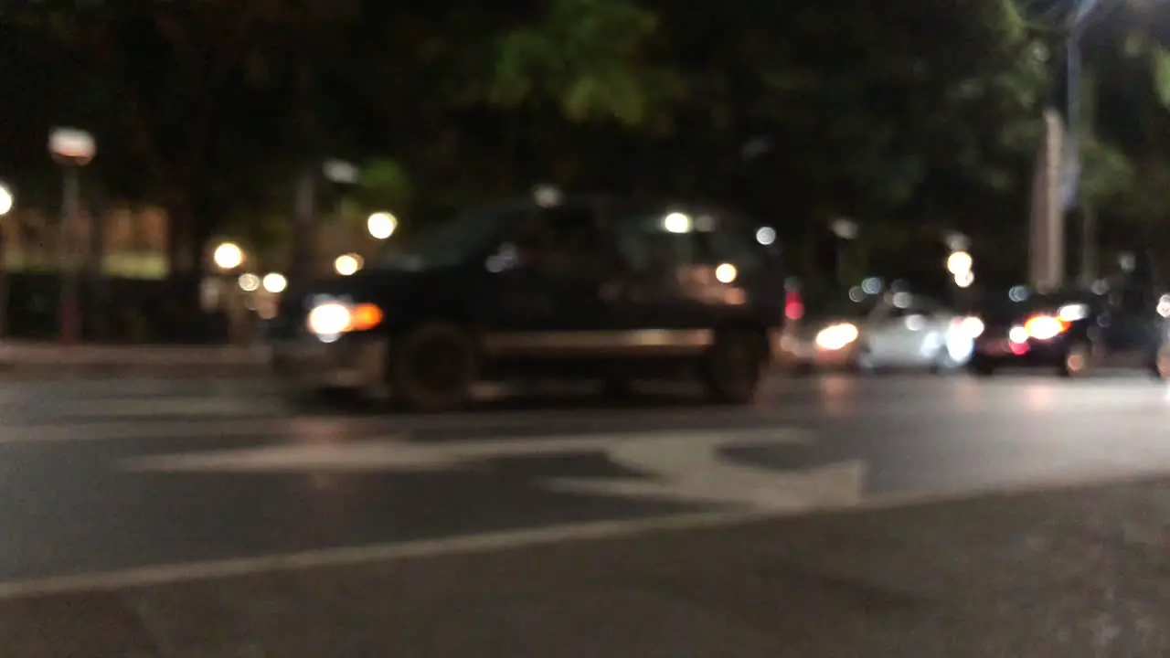 Blurred scene of cars passing by in a low traffic street in Guayaquil Ecuador-1