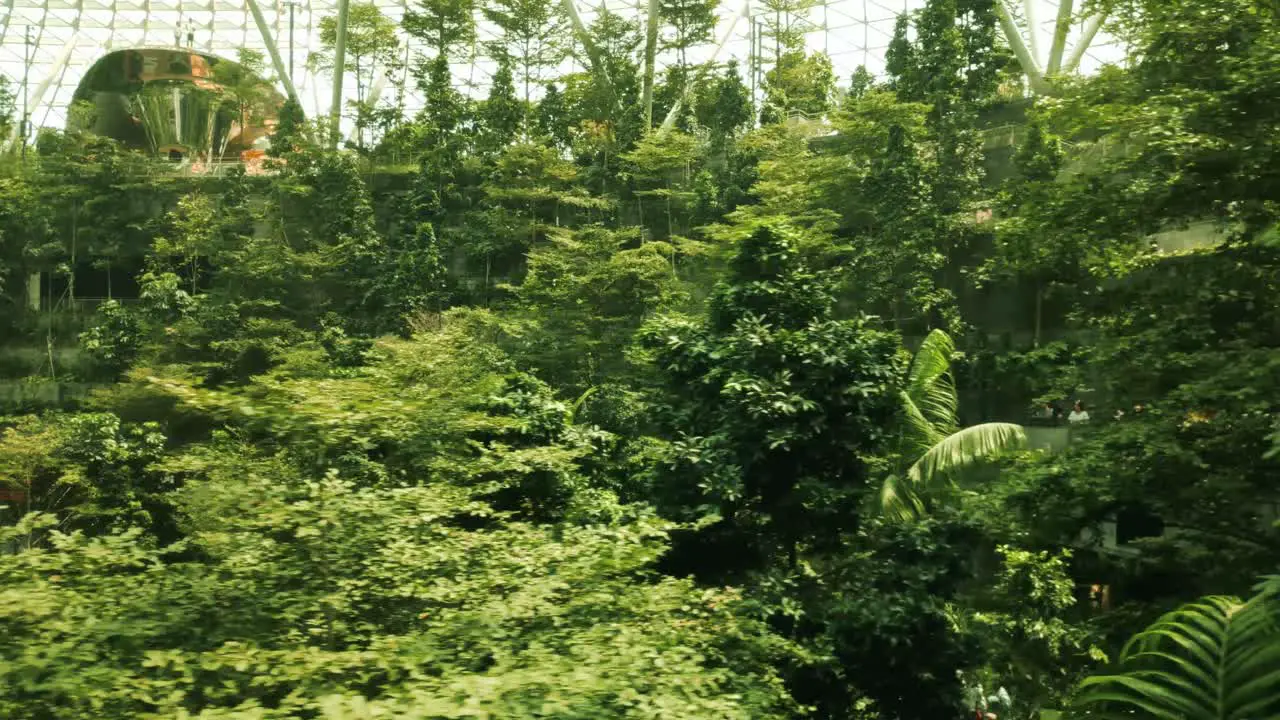 Singapore Changi aerial Jewel Rain Vortex waterfall pan