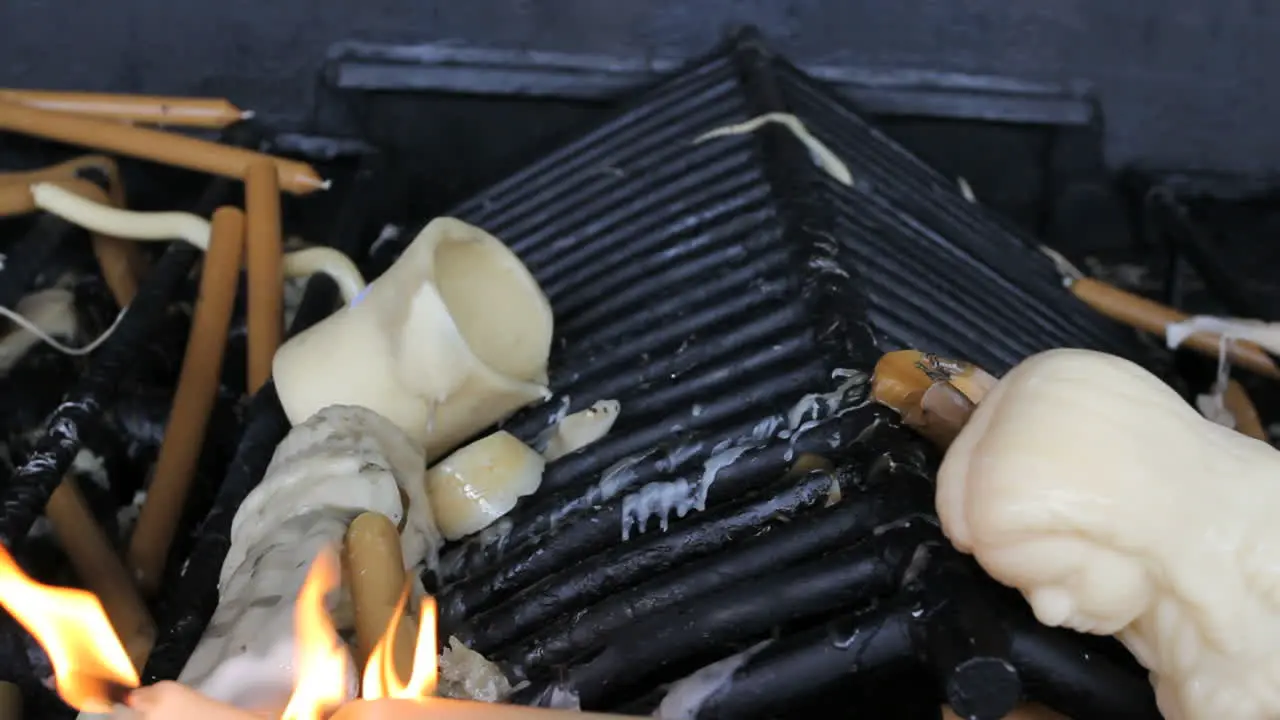 Fatima wax offerings burning