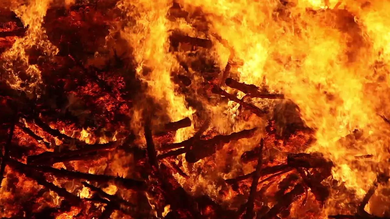 Close up of a huge bonfire raging at night