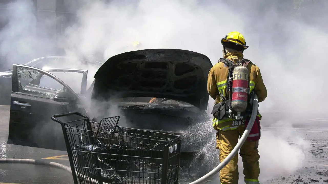 smoke coming out of burning car