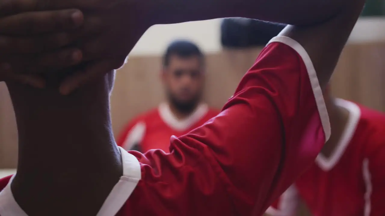 Animation of diverse male soccer players in changing room