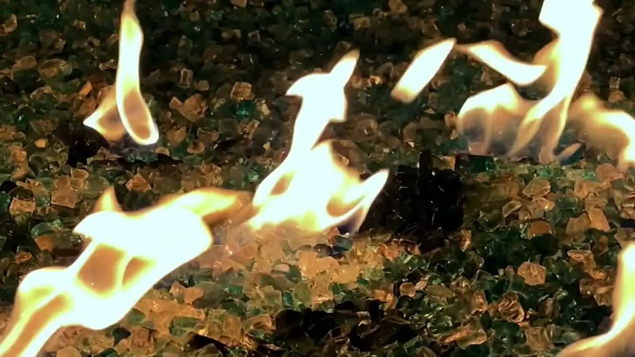 Flames flickering on fire pit slow motion closeup