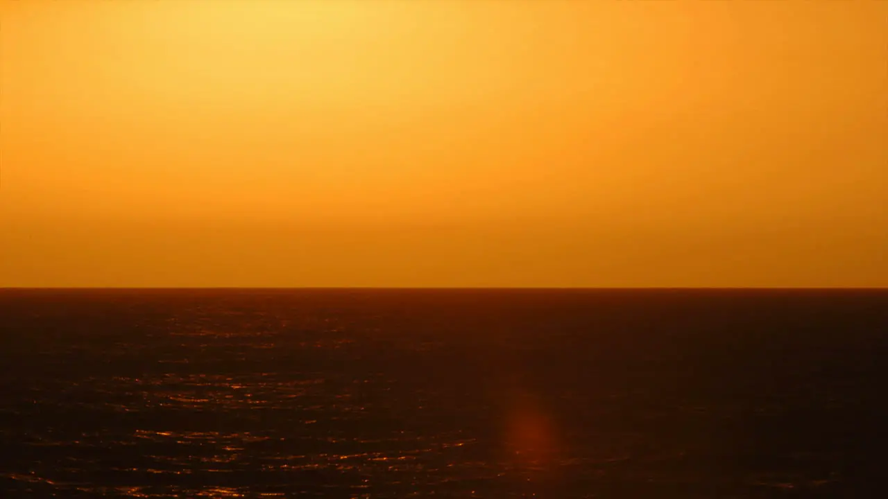 Time lapse of sun setting over the ocean 1