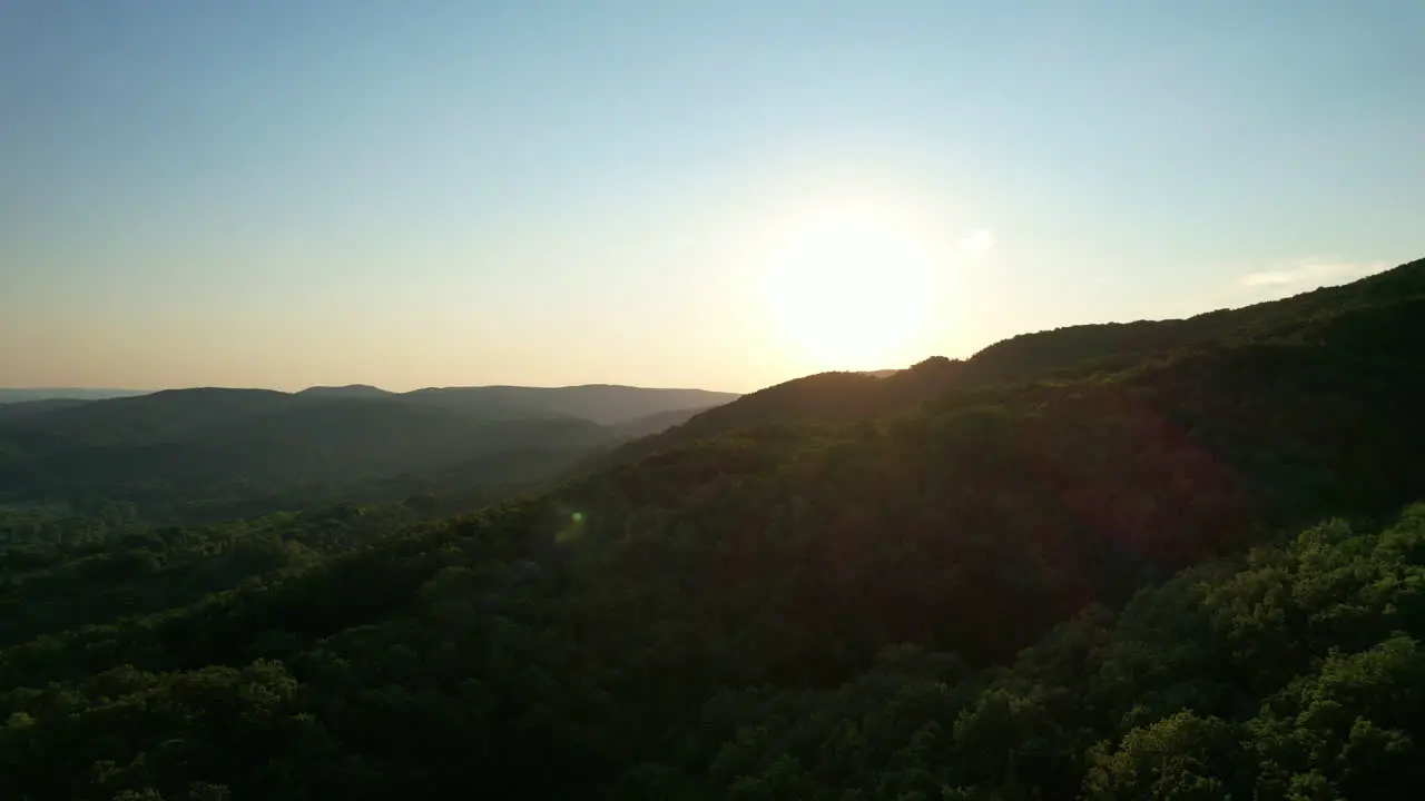 Drone Shot over bulgarian village into hills and woods 03