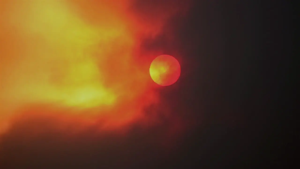 Smoke from a wild fire obscures the sun