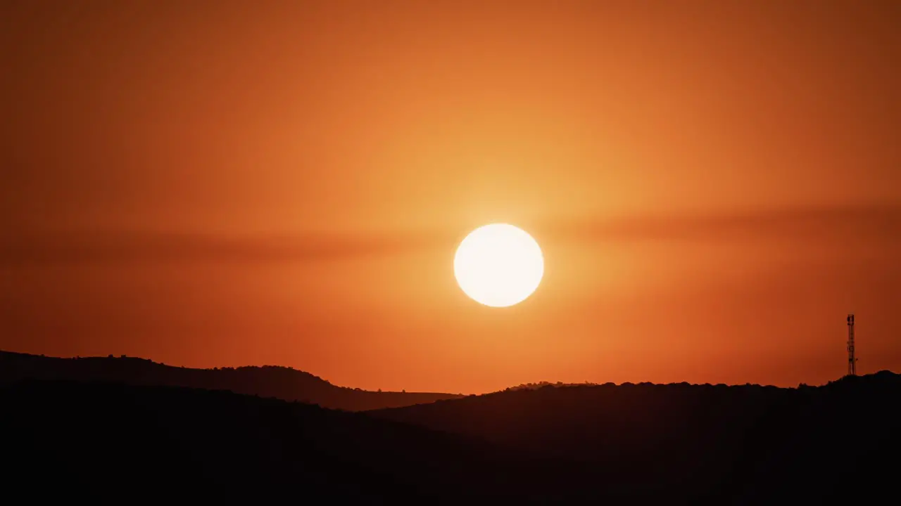 Timelapse of sunrise over mountains