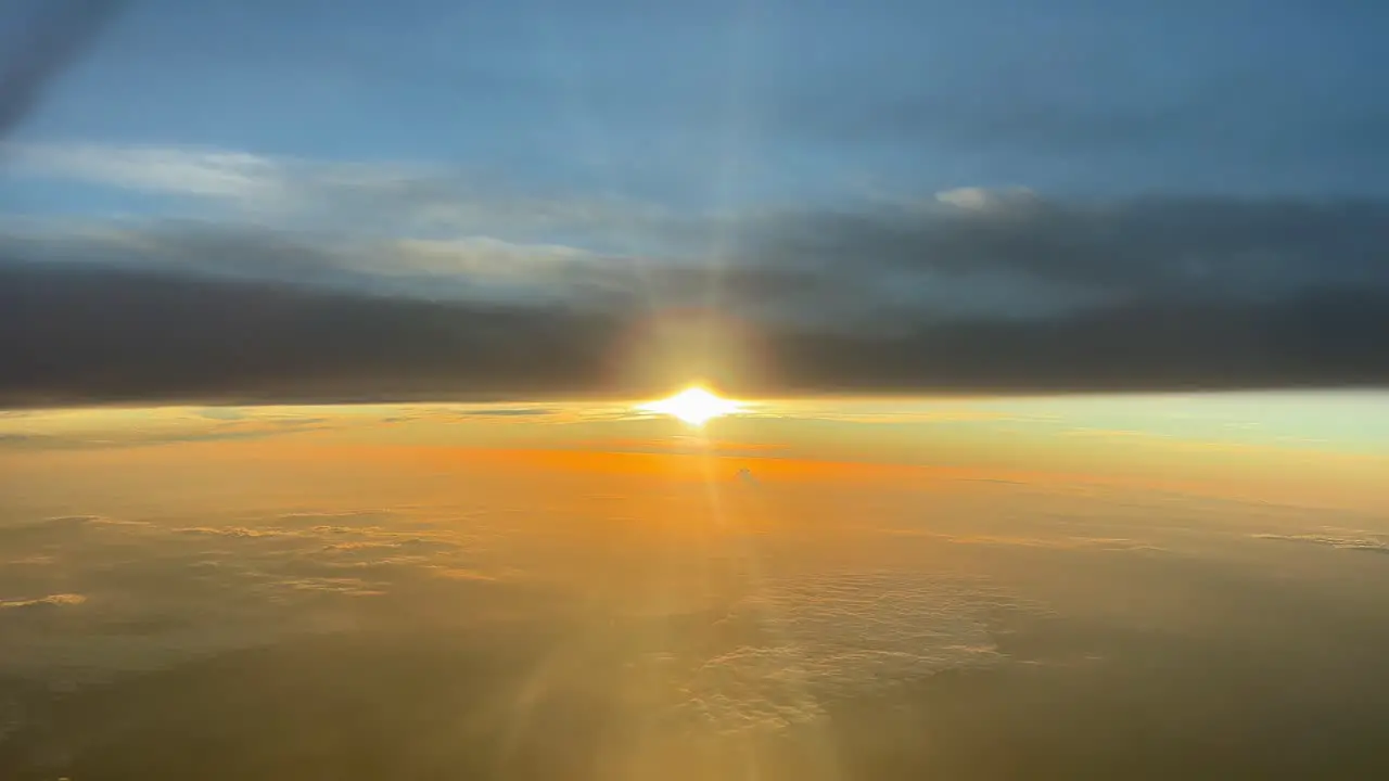 Spectacular sunset recorded from a jet cockpit at 12000 metres high