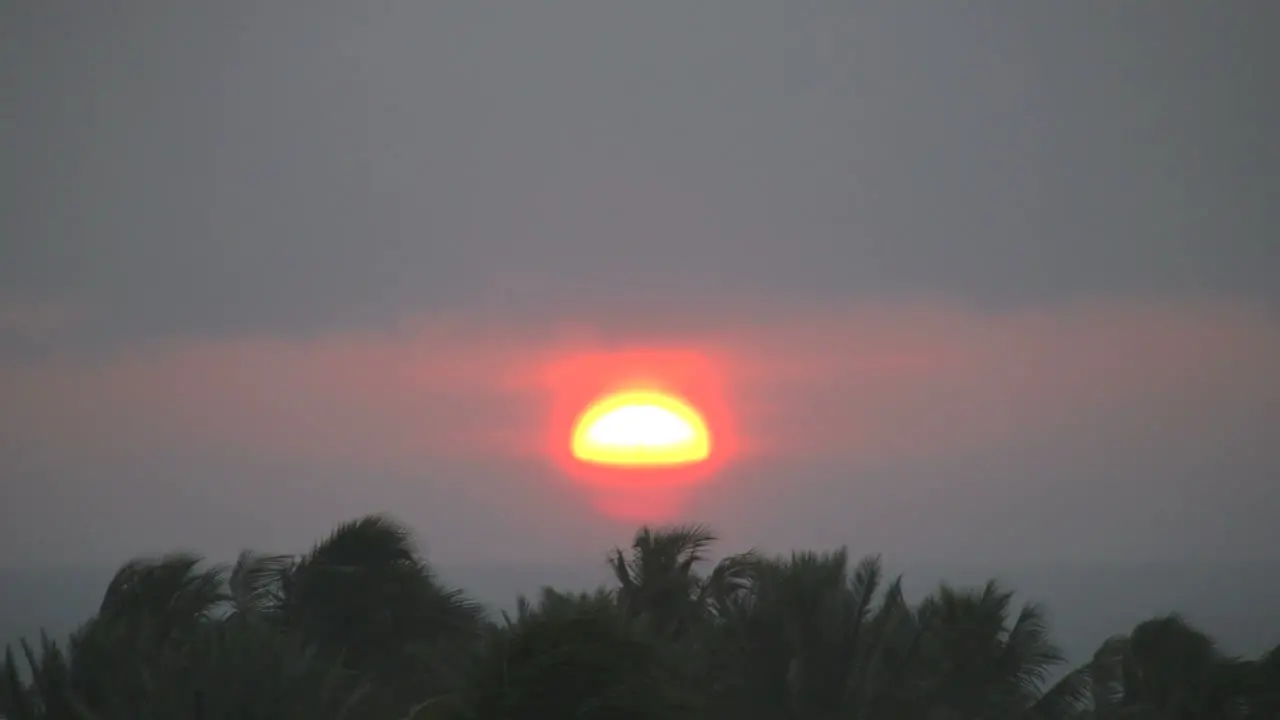 Florida Key West Sun Moving Under Cloud At Sunset