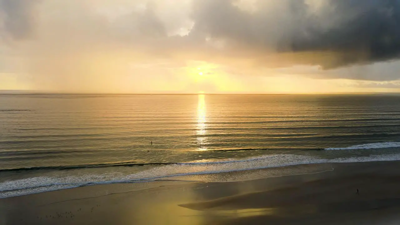 Sun rising at beach in a calm morning