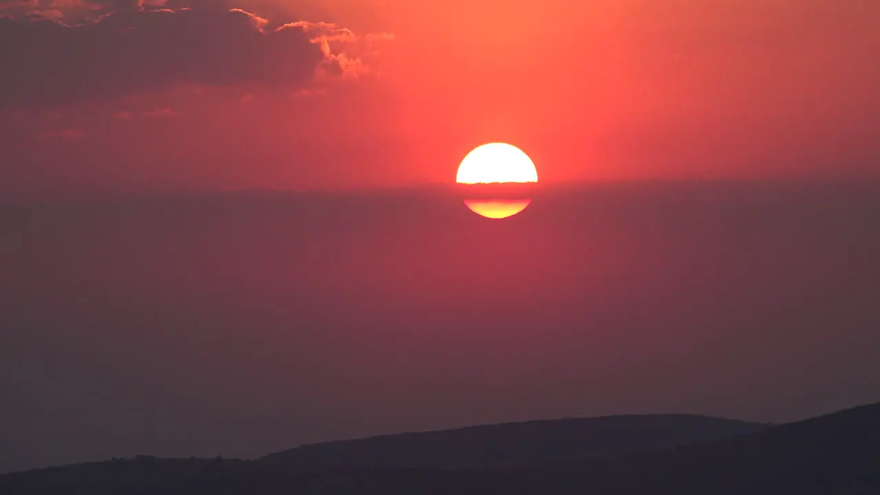 Mexico Sun Setting With Cloud Over