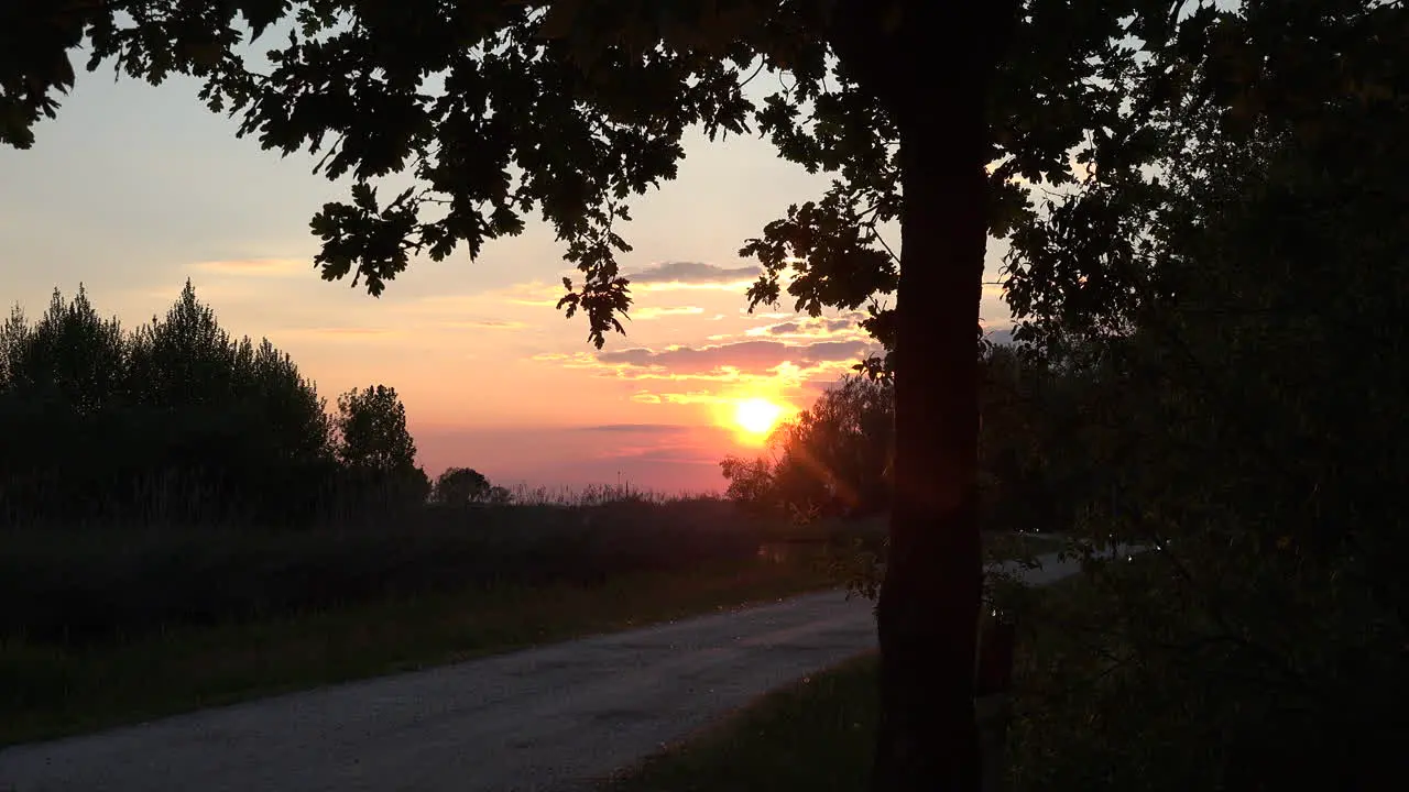 Italy Setting Sun Over Back Road