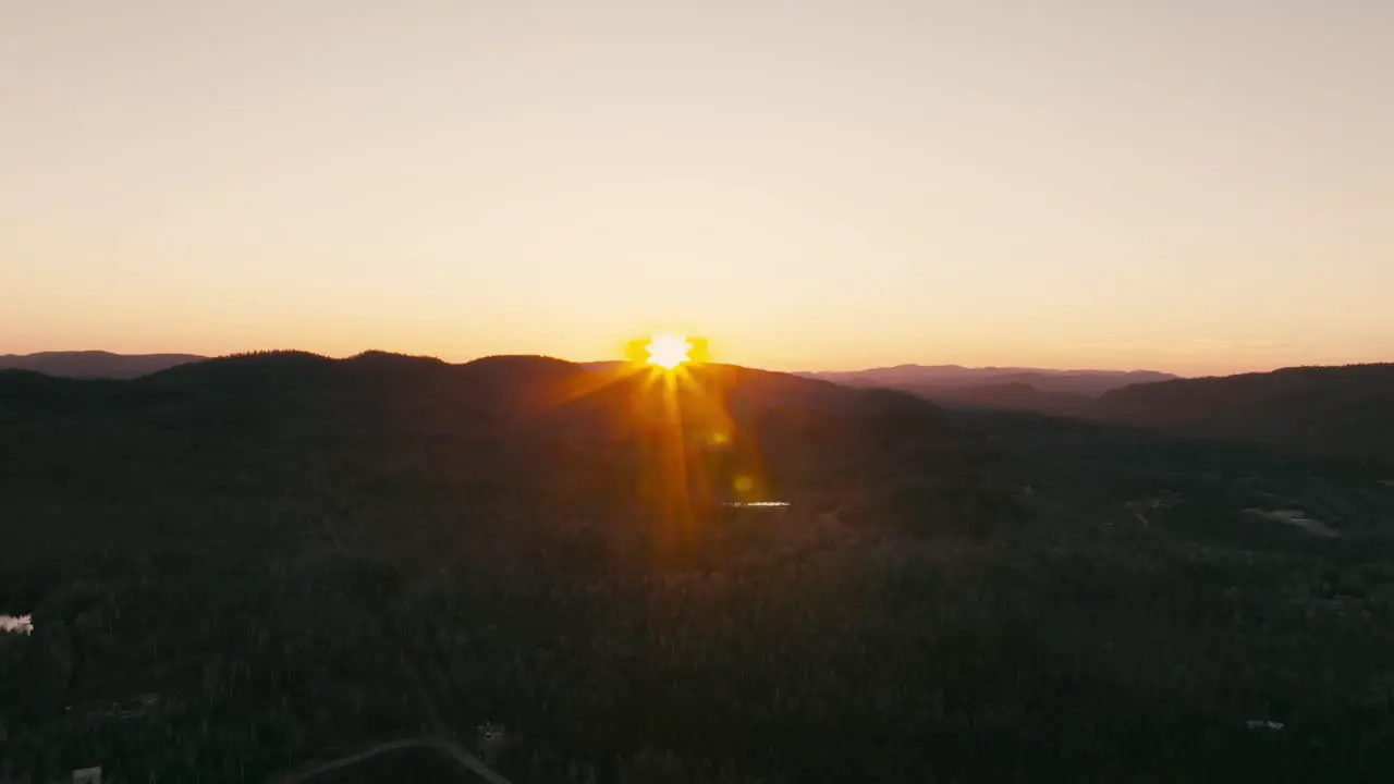 Vivid Golden Sunset Illuminated Over Forest Mountain Hike In Saint-Come Quebec Canada