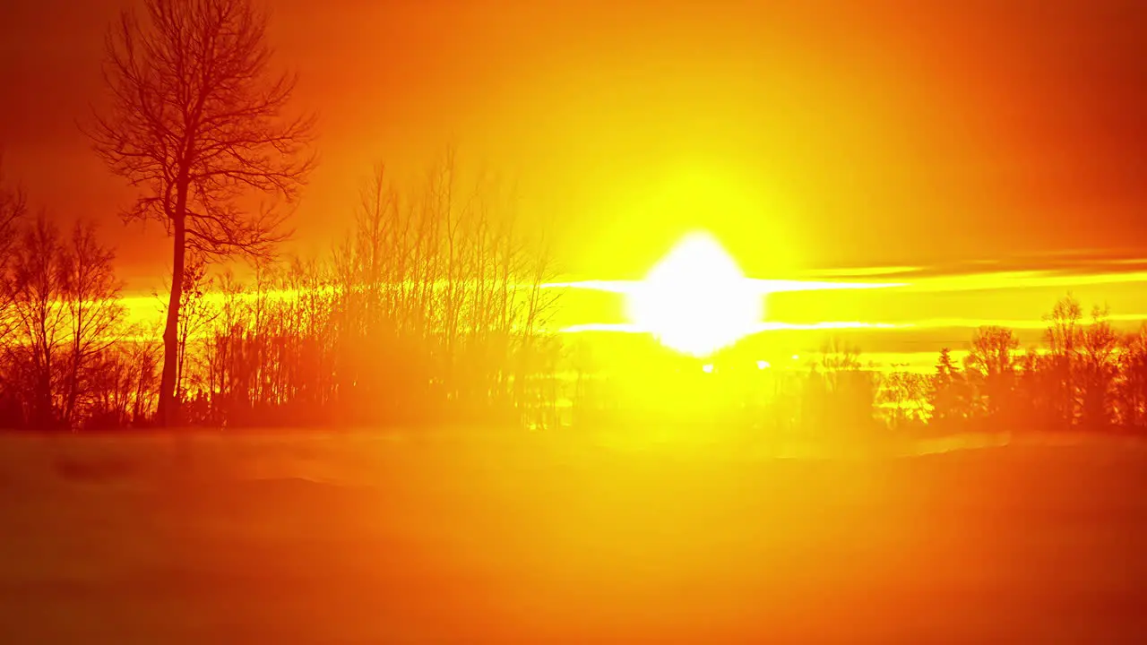 Time lapse of cloud with sunset sky over snow land