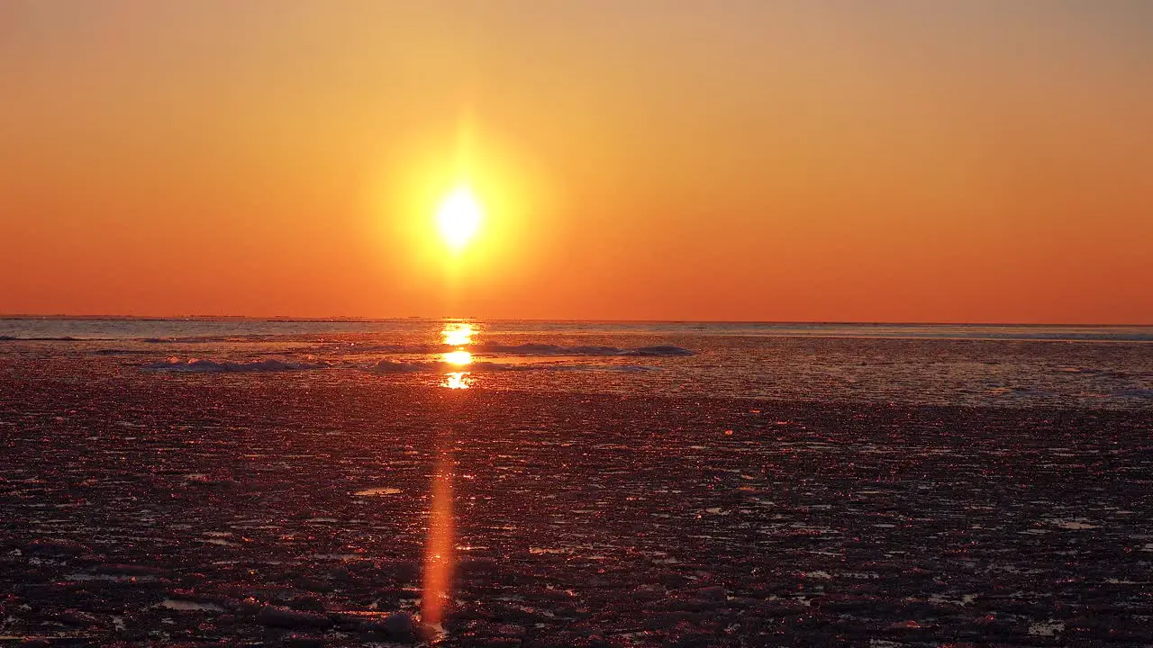 Frozen and Icey Water Winter Sunrise