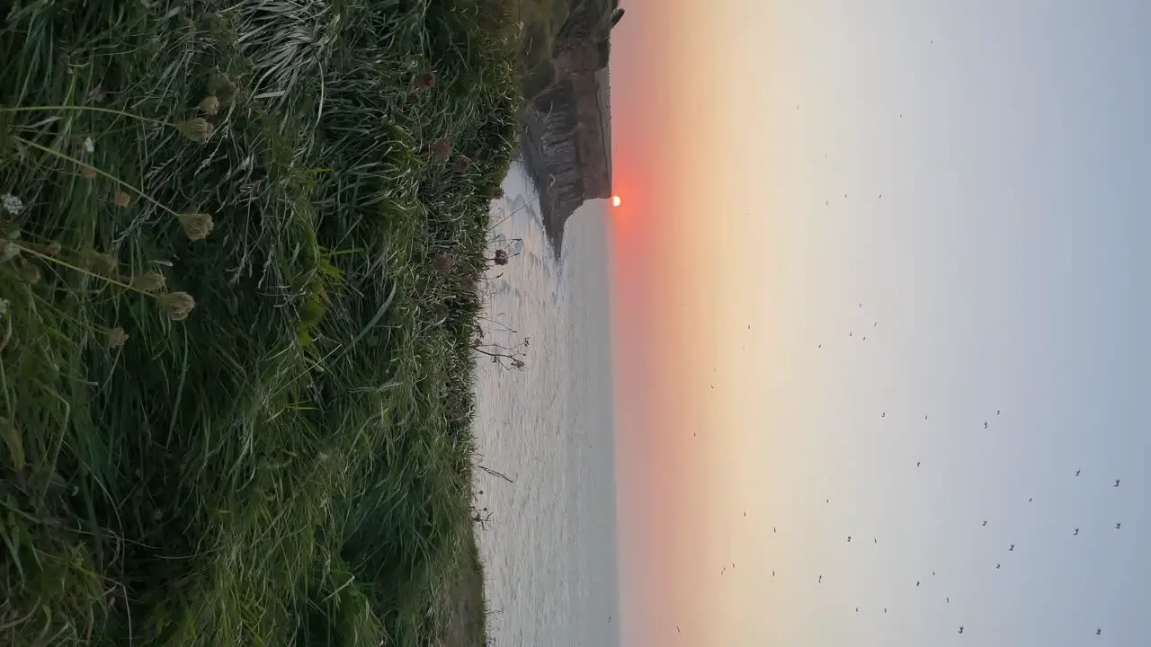 Ground level view of D-Day landing beach in magnificent sunset