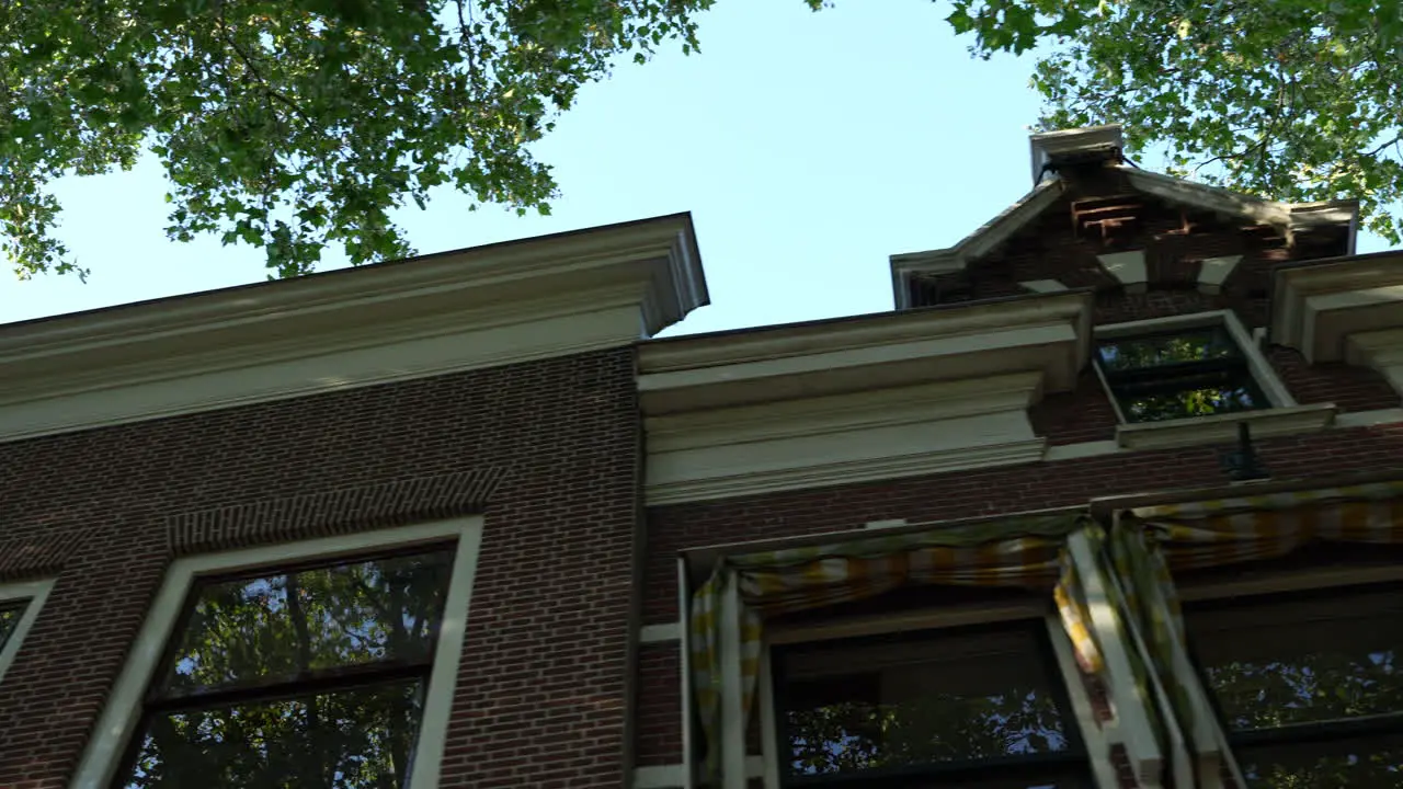 A View Of Traditional Dutch Culture Architecture Houses Along Lage Gouwe Street In Gouda Netherlands