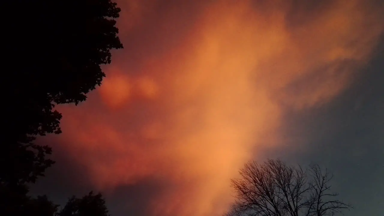 Deep orange storm clouds at sunset