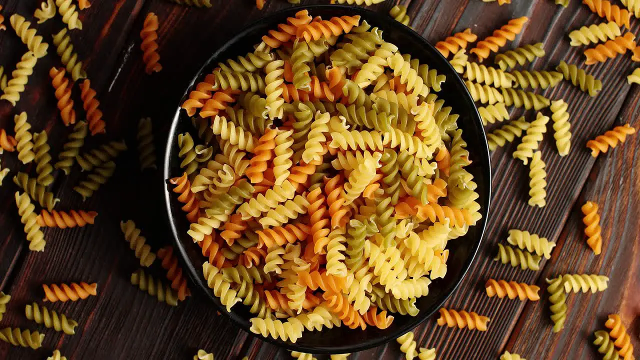 Macaroni placed in big black bowl