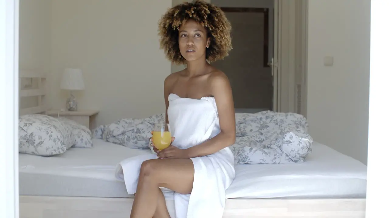 Relaxed Woman Drinking Orange Juice