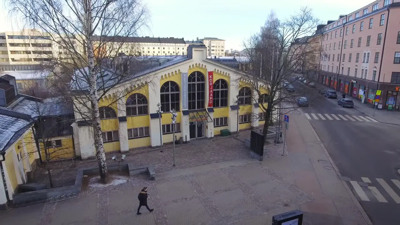 Aerial footage of Kulttuuritehdas Korjaamo event venue and Ratikkamuseo on a sunny winter day