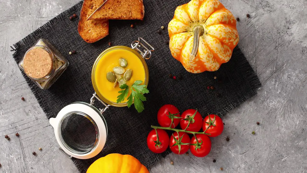 Pumpkin soup with vegetables on napkin