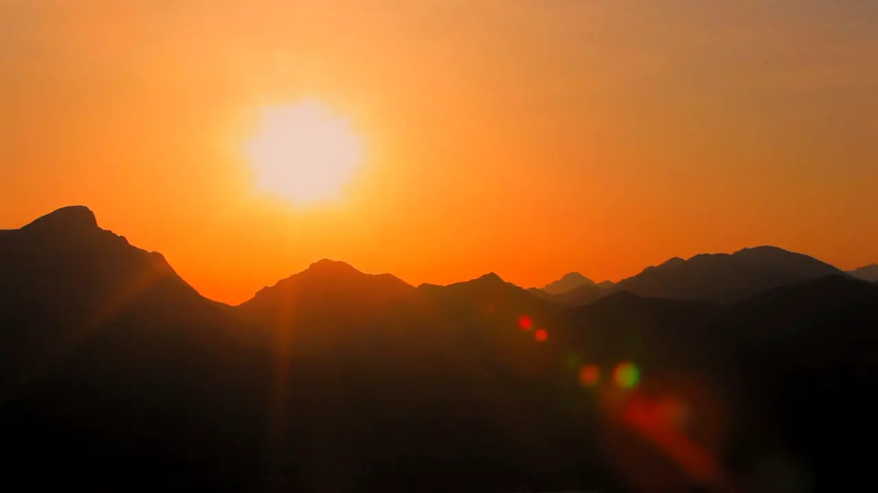 Sunset behind the mountains of Lake Garda