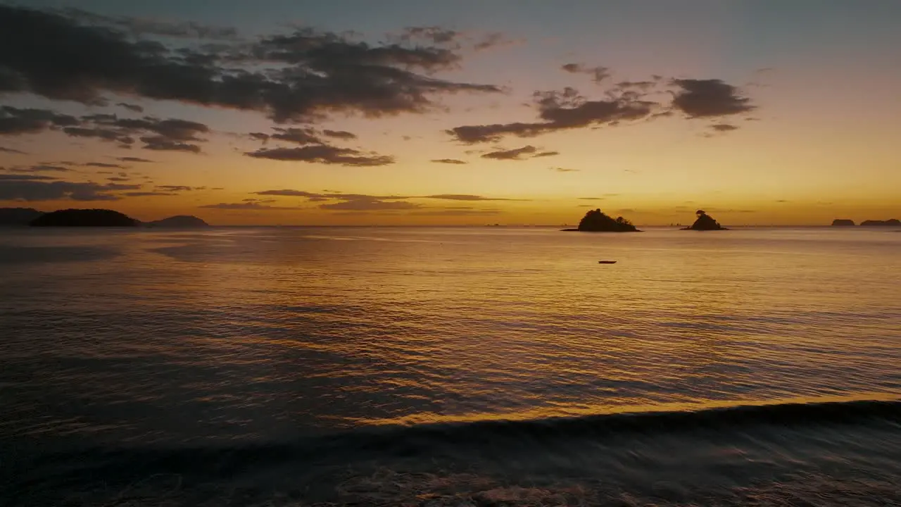 Rippling Sea Water During Golden Orange Dusk In Costa Rica wide